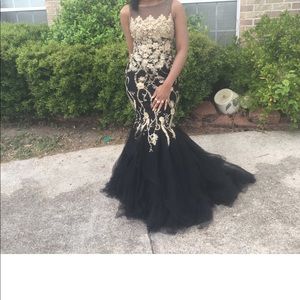 Black and gold prom dress or ball gown